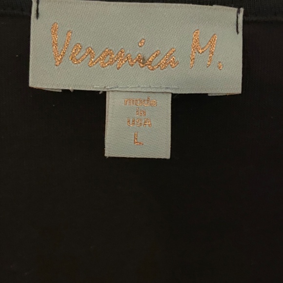 Flared long sleeve black knot top - Picture 2 of 3